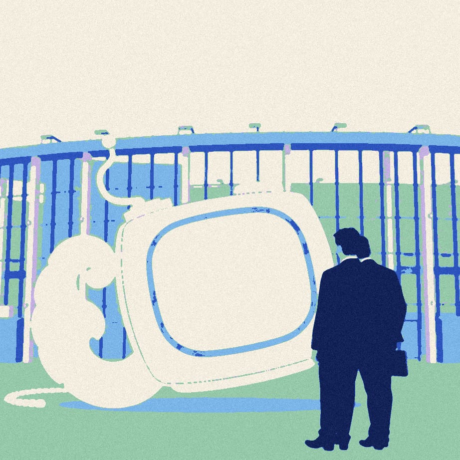 Two faceless suited men whisper beside an oversized baby monitor propped against a stadium gate in front of large windows.