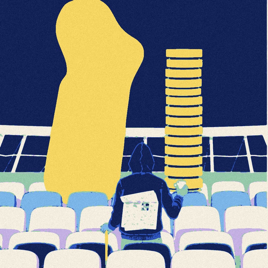 A small figure in a dark hooded coat sits in a stadium seat beside a giant slice of toast flanked by two perfectly equal stacks of footballs.