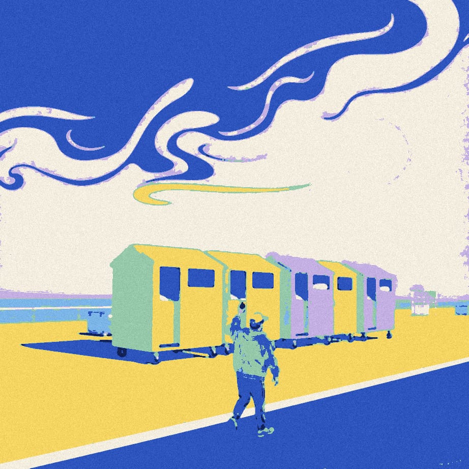 A line of wheeled beach huts stuffed with bunk beds trundles along a seafront behind a capped figure in a training jacket carrying a pint glass.